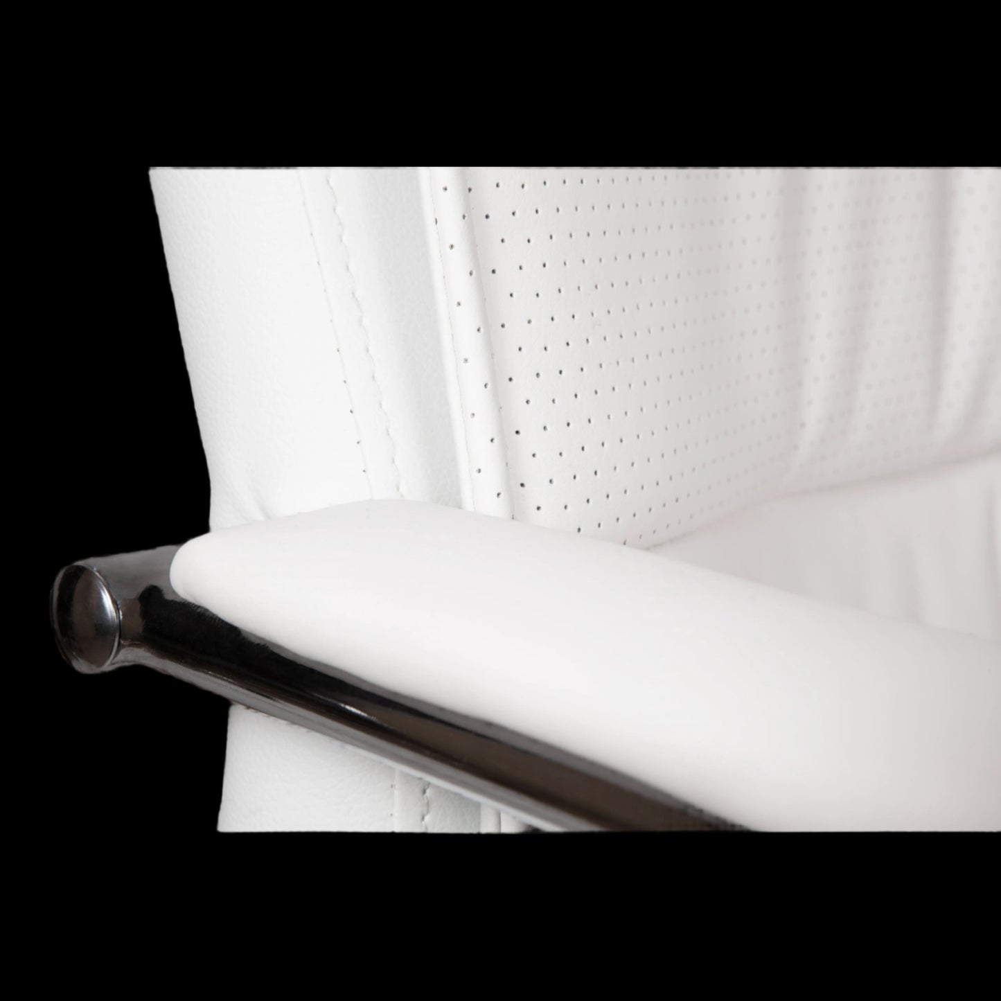 Close-up of a white chair with a metallic armrest on a black background