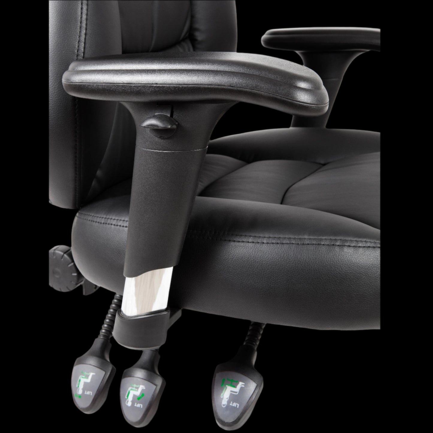Black office chair with armrests and footrest on a black background