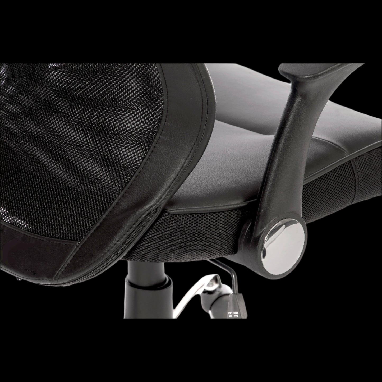 Close-up of a black office chair with mesh backrest and armrests on a black background