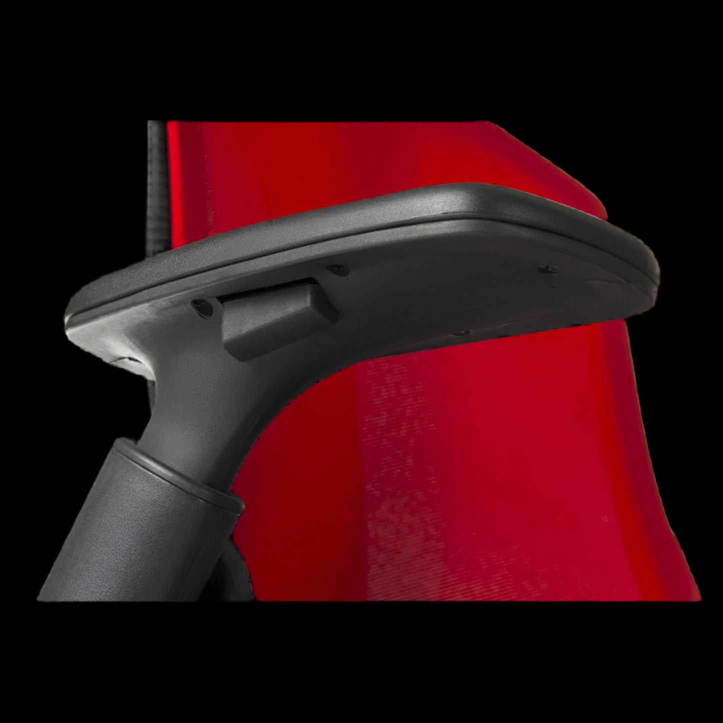 Office chair with a red mesh backrest on a black background