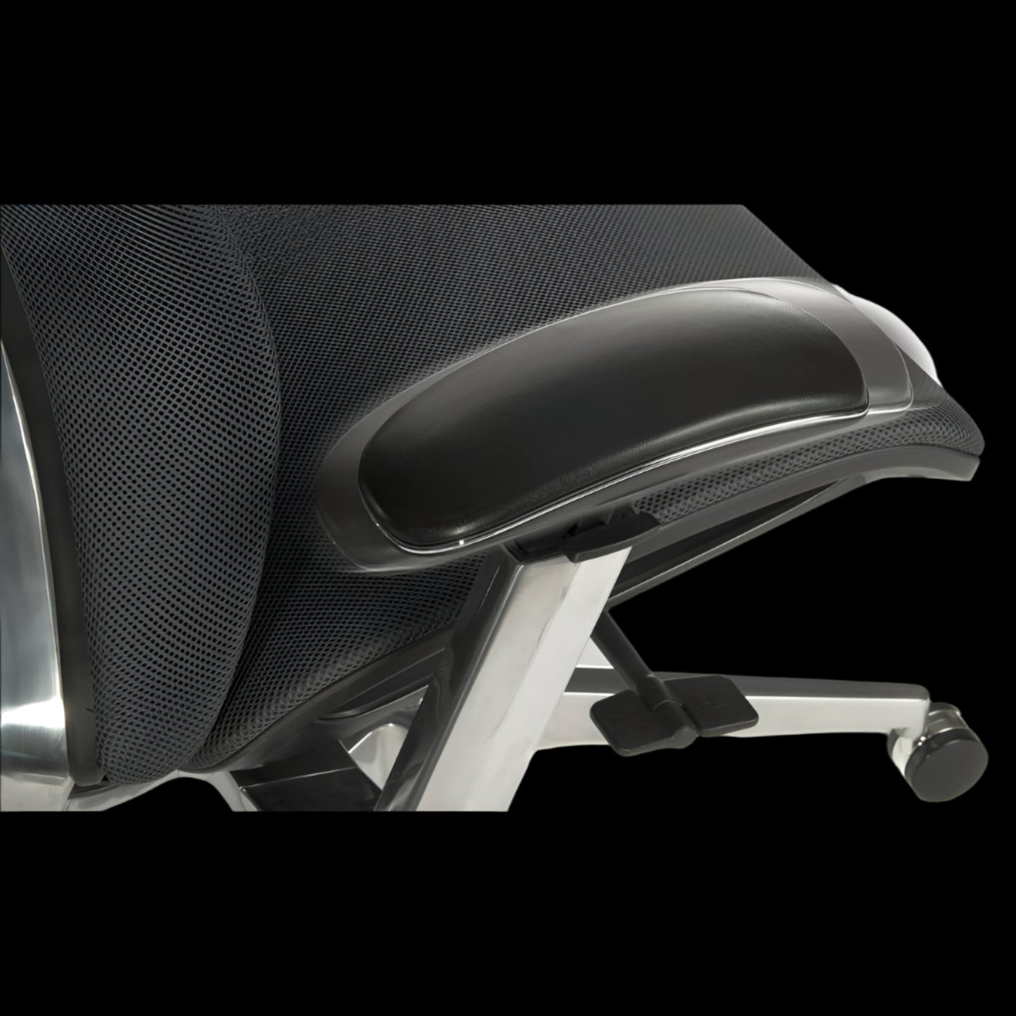 Close-up of a black office chair with mesh backrest and armrests on a black background