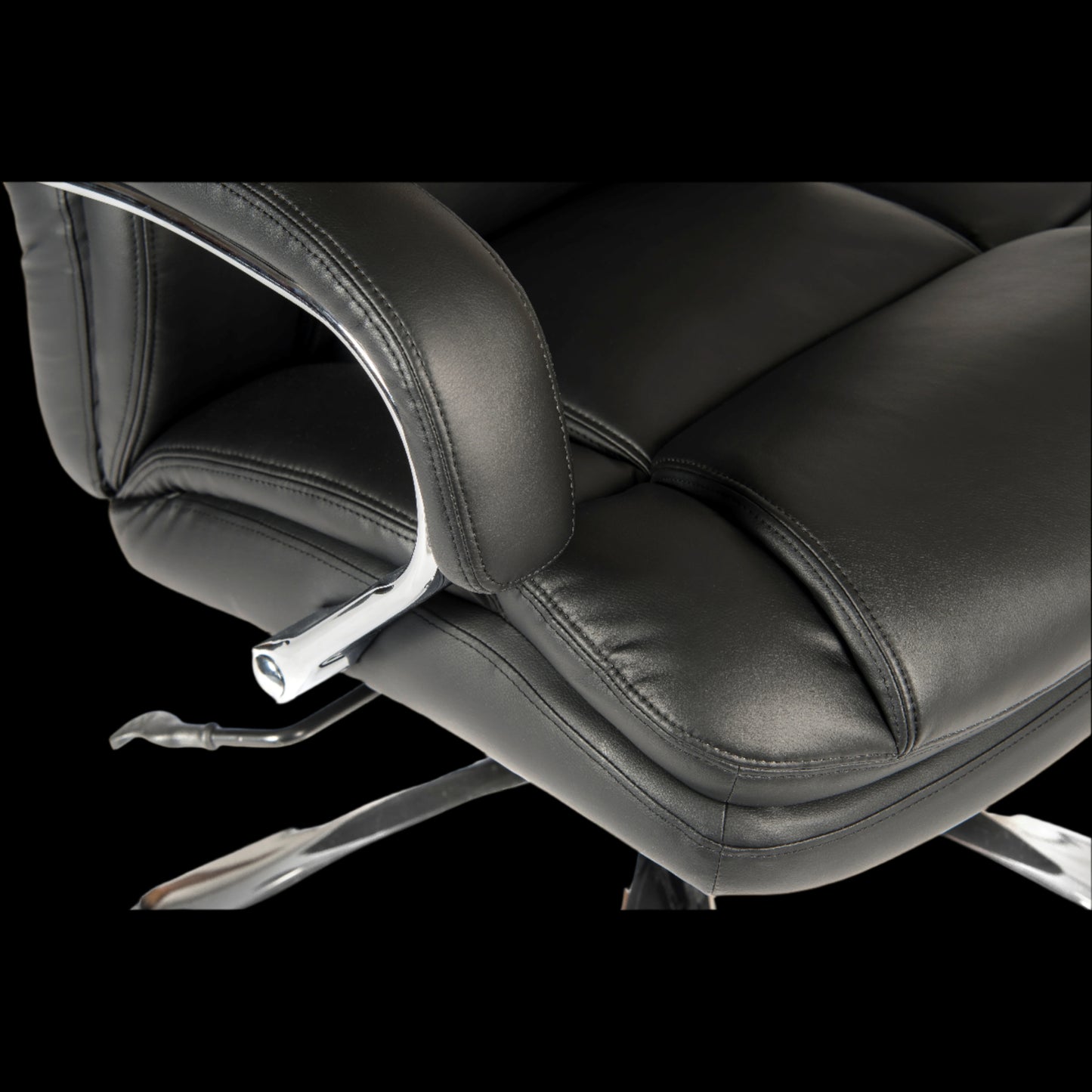 Black office chair with a black background