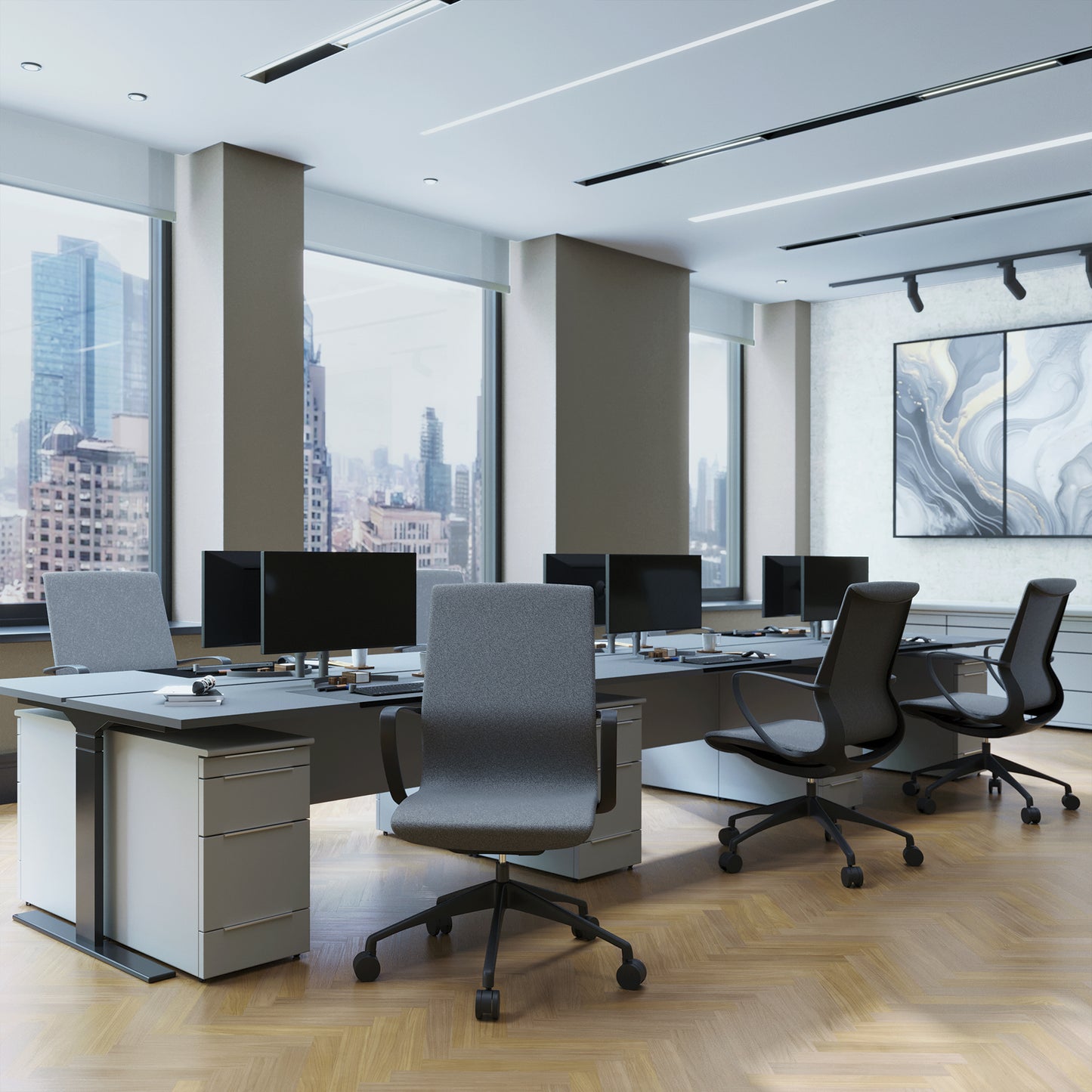 Modern office space with desks, chairs, and large windows overlooking a cityscape.