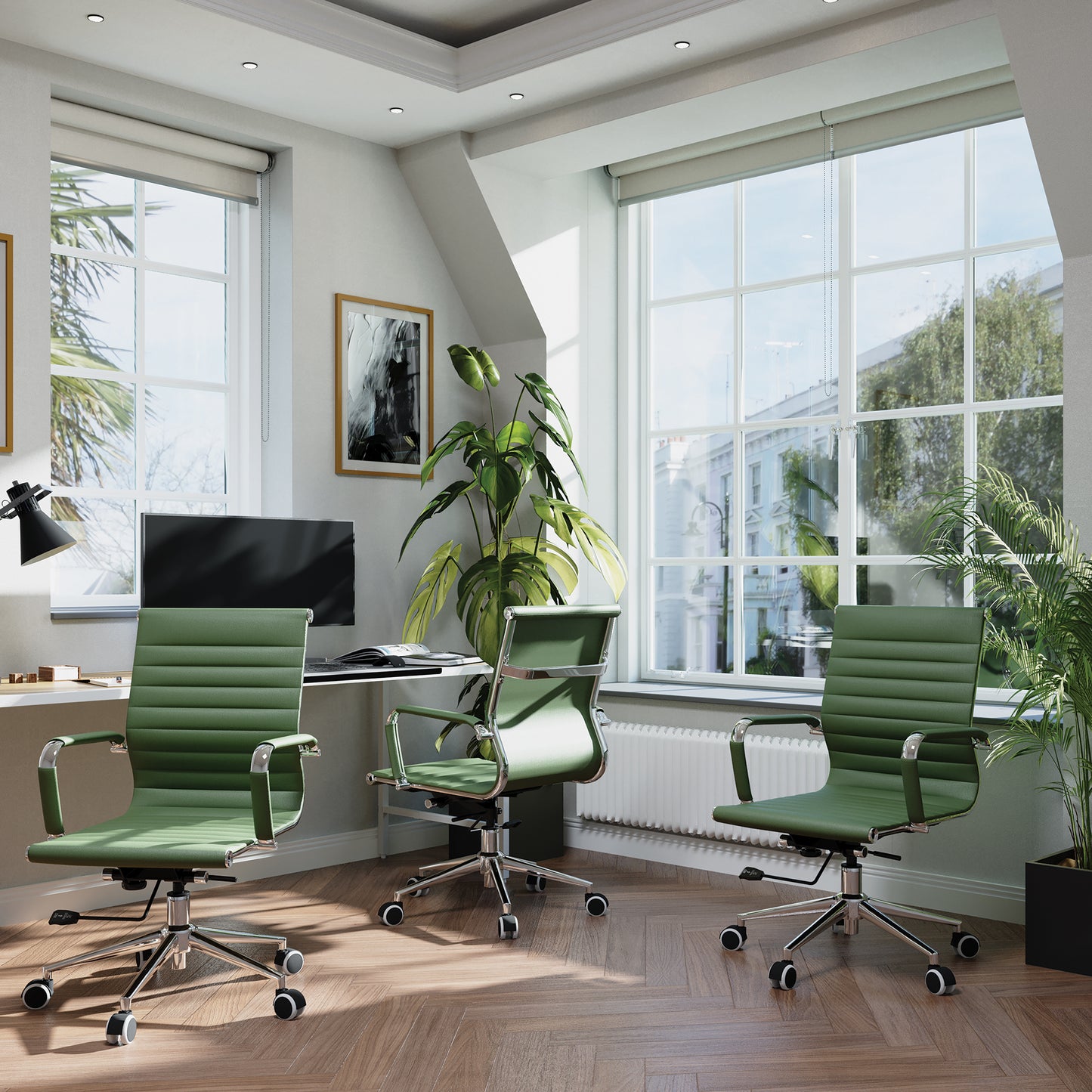 Modern office interior with green chairs, a desk, and large windows.