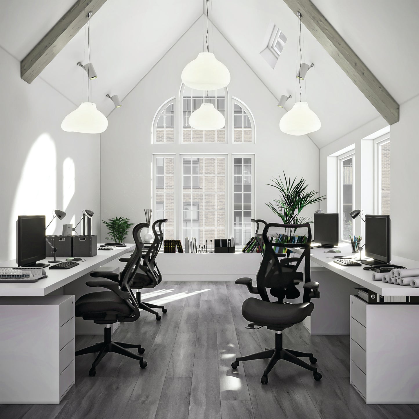 Modern office space with white desks, black chairs, and large windows.