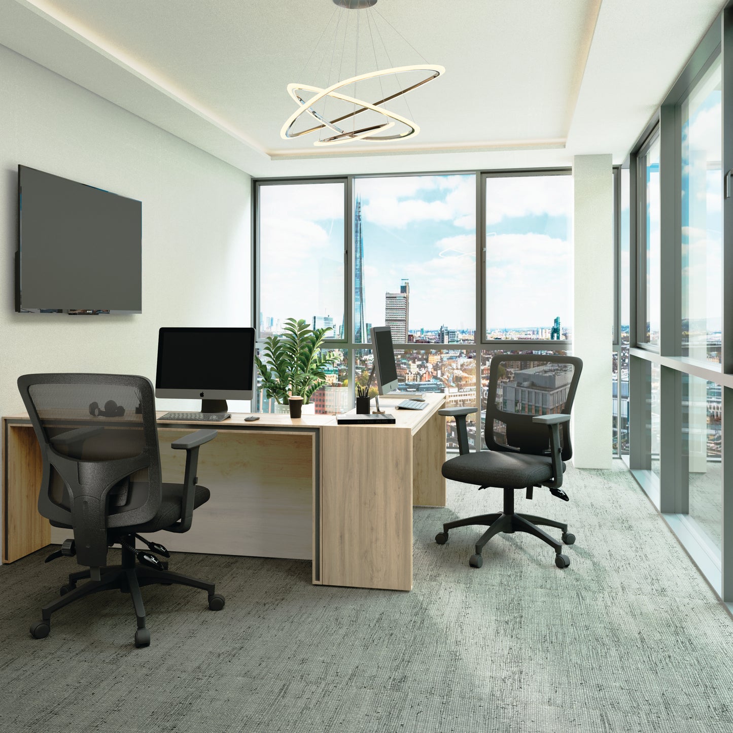 Modern office space with a desk, chairs, and city view