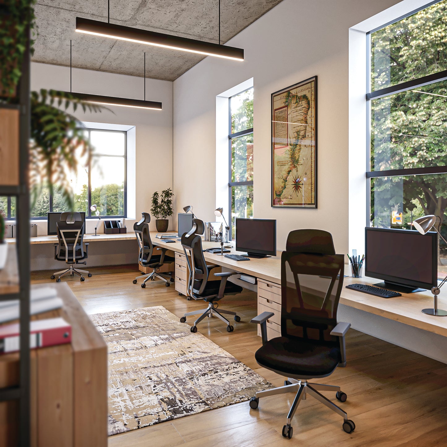 Modern office space with desks, chairs, and large windows.
