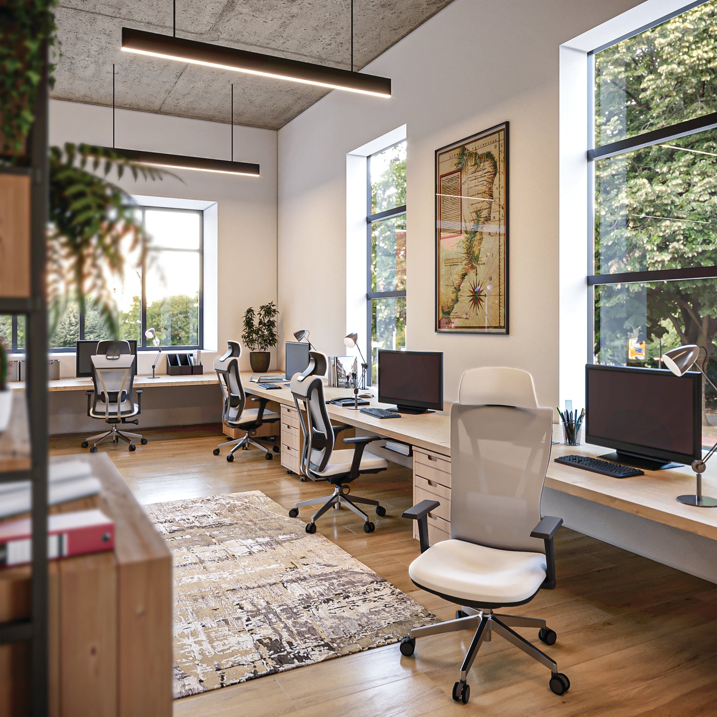 Modern office space with desks, chairs, and large windows.
