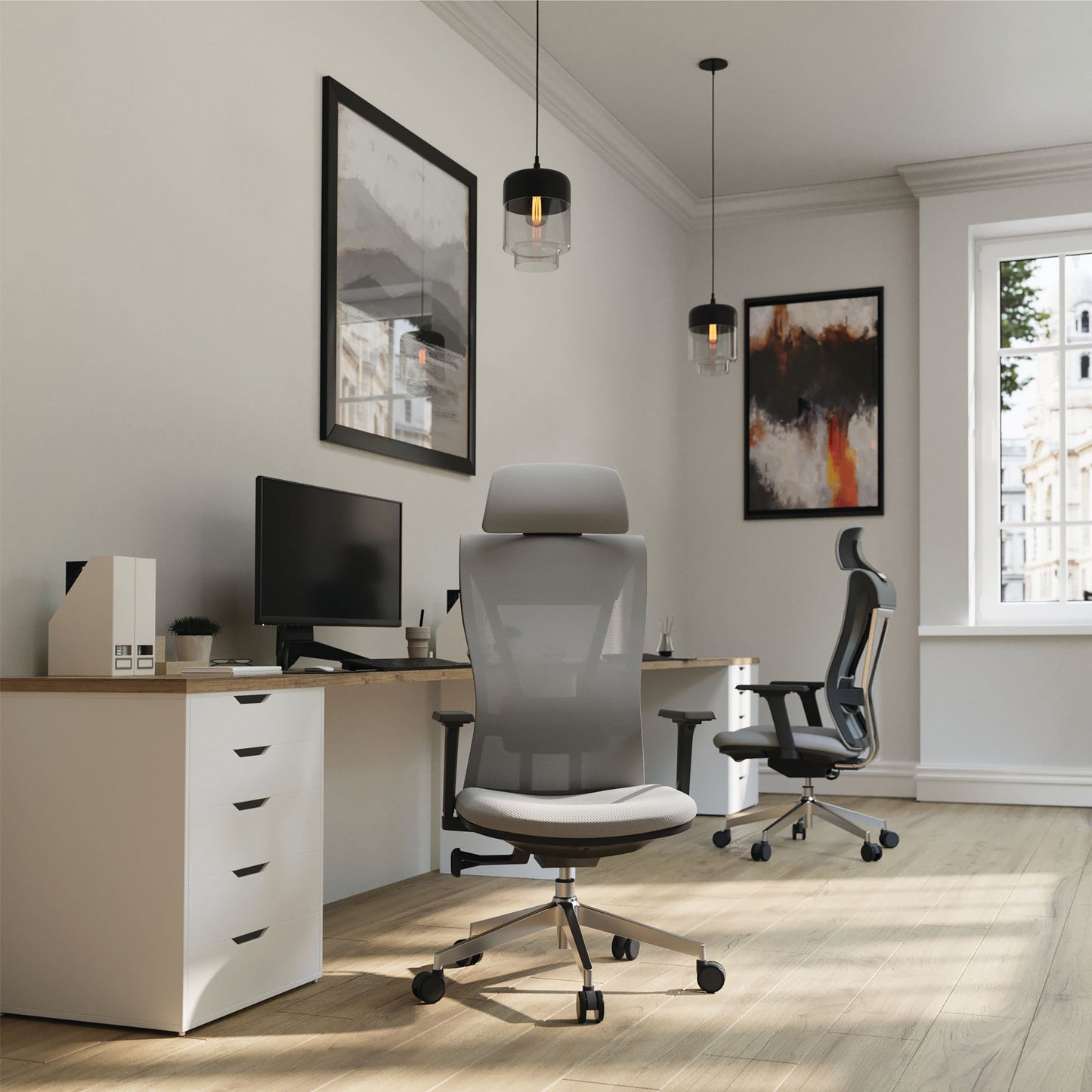 Modern office setup with ergonomic chairs, desk, and decor.