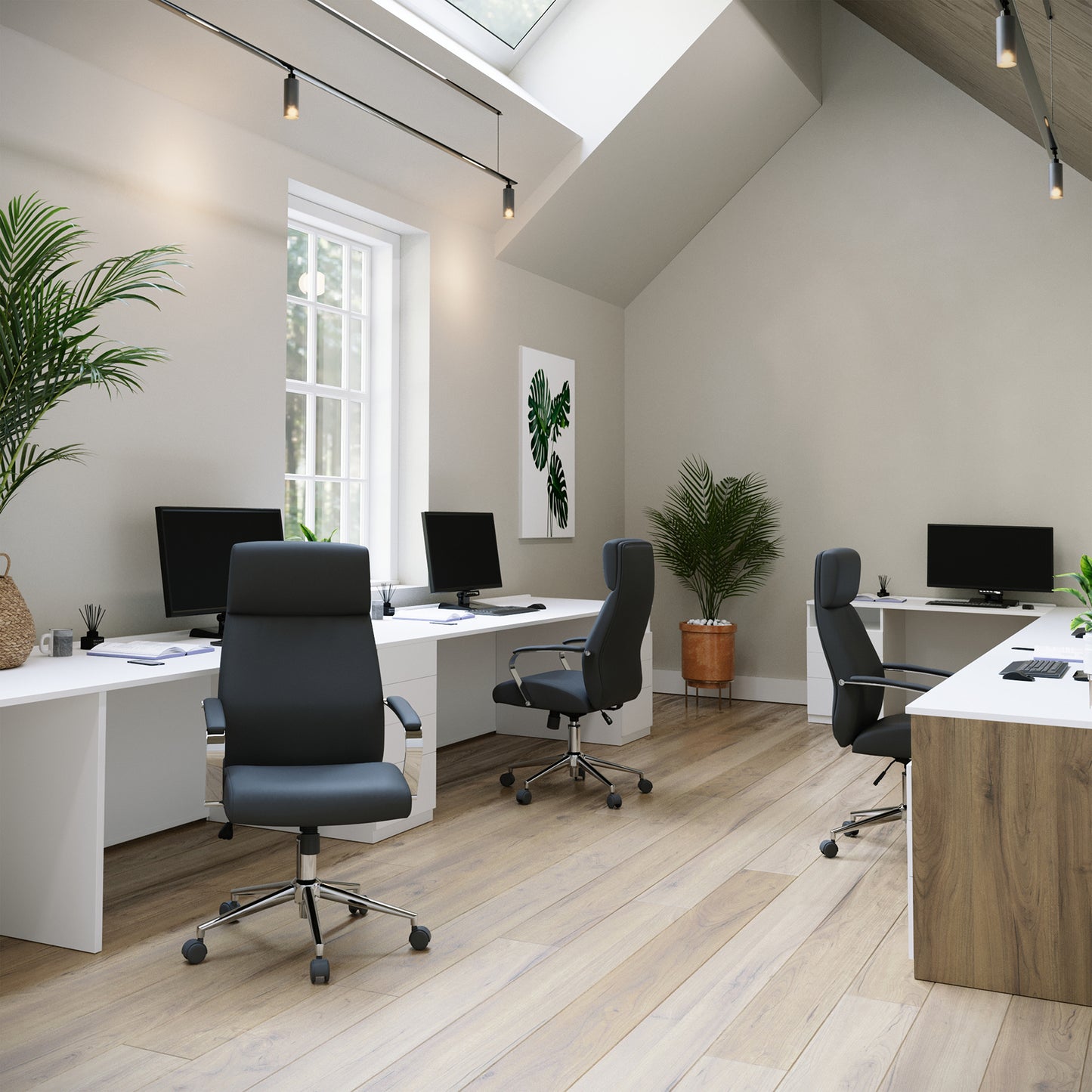 Modern office space with desks, chairs, and decor
