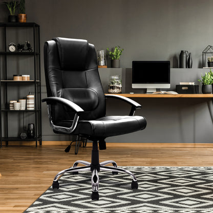 Black leather office chair in a modern room with a desk and decor.