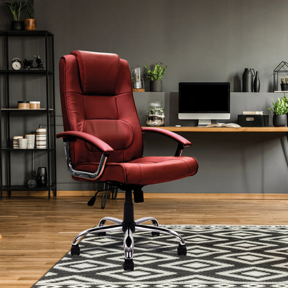 Red office chair in a home office setting with a desk and decor.