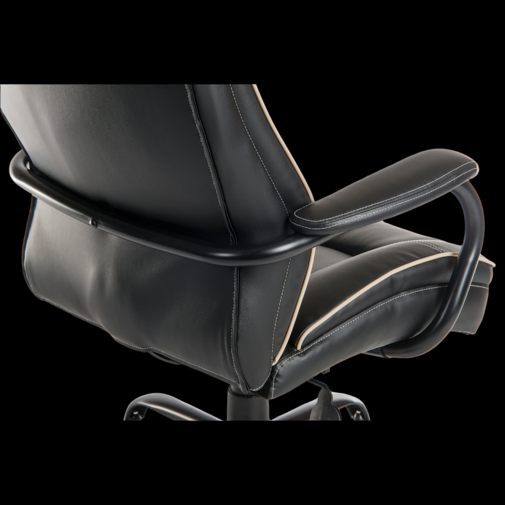 Black office chair with armrests on a black background