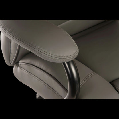 Close-up of a gray car seat with headrest on a black background