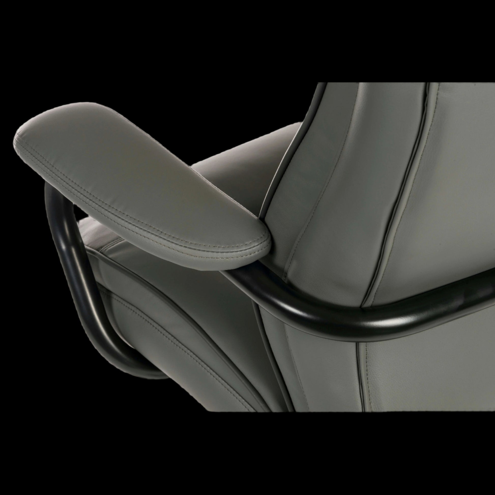 Gray office chair with armrest on a black background