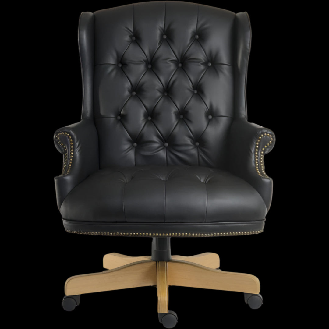 Black leather office chair with wooden base on a black background