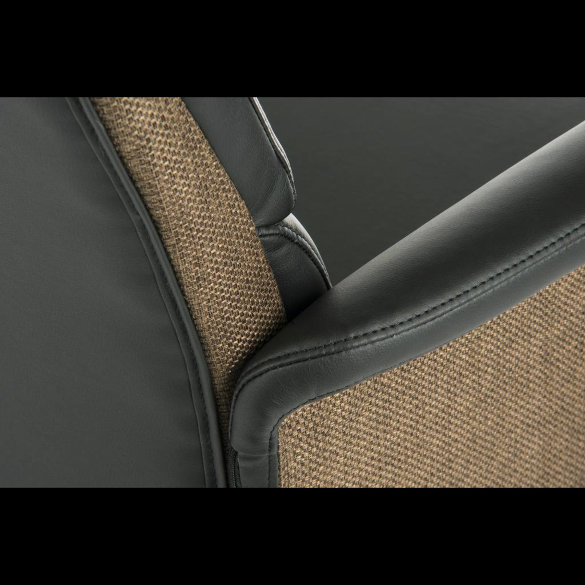 Close-up of a chair with gray and brown fabric