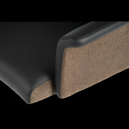 Close-up of a black and brown textured product corner on a black background