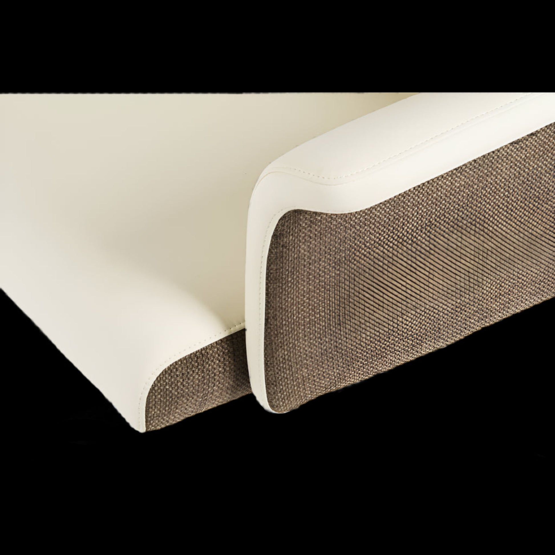 Close-up of a textured brown strip on a black background