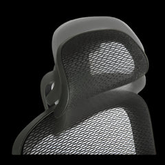 Close-up of a mesh office chair backrest on a black background