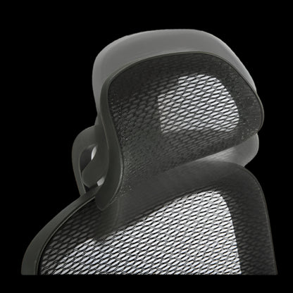 Close-up of a mesh office chair backrest on a black background