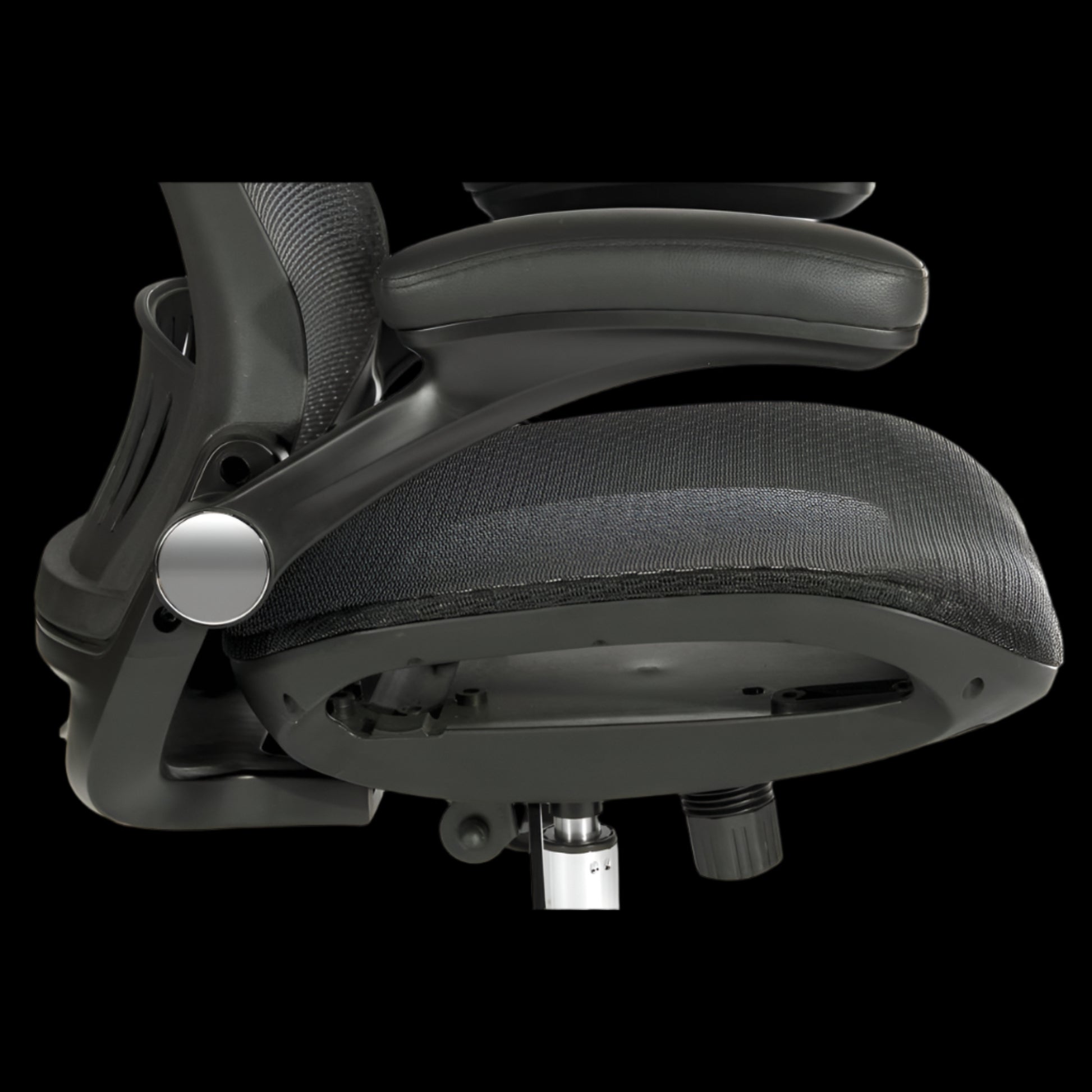 Close-up of a black office chair with adjustable features on a black background