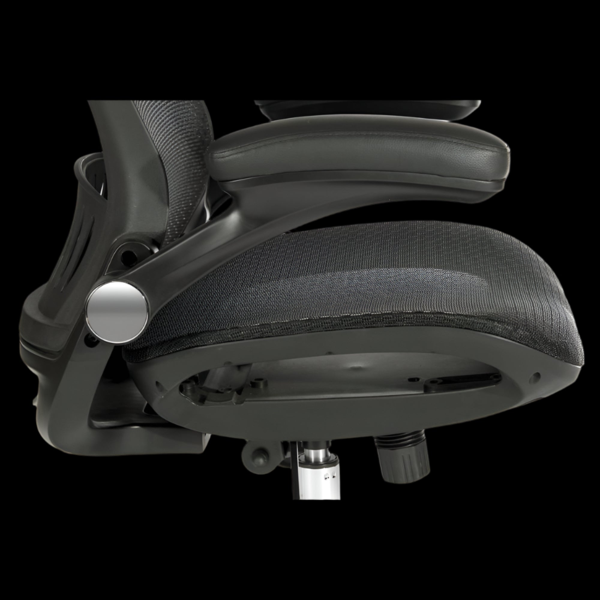 Close-up of a black office chair with adjustable features on a black background