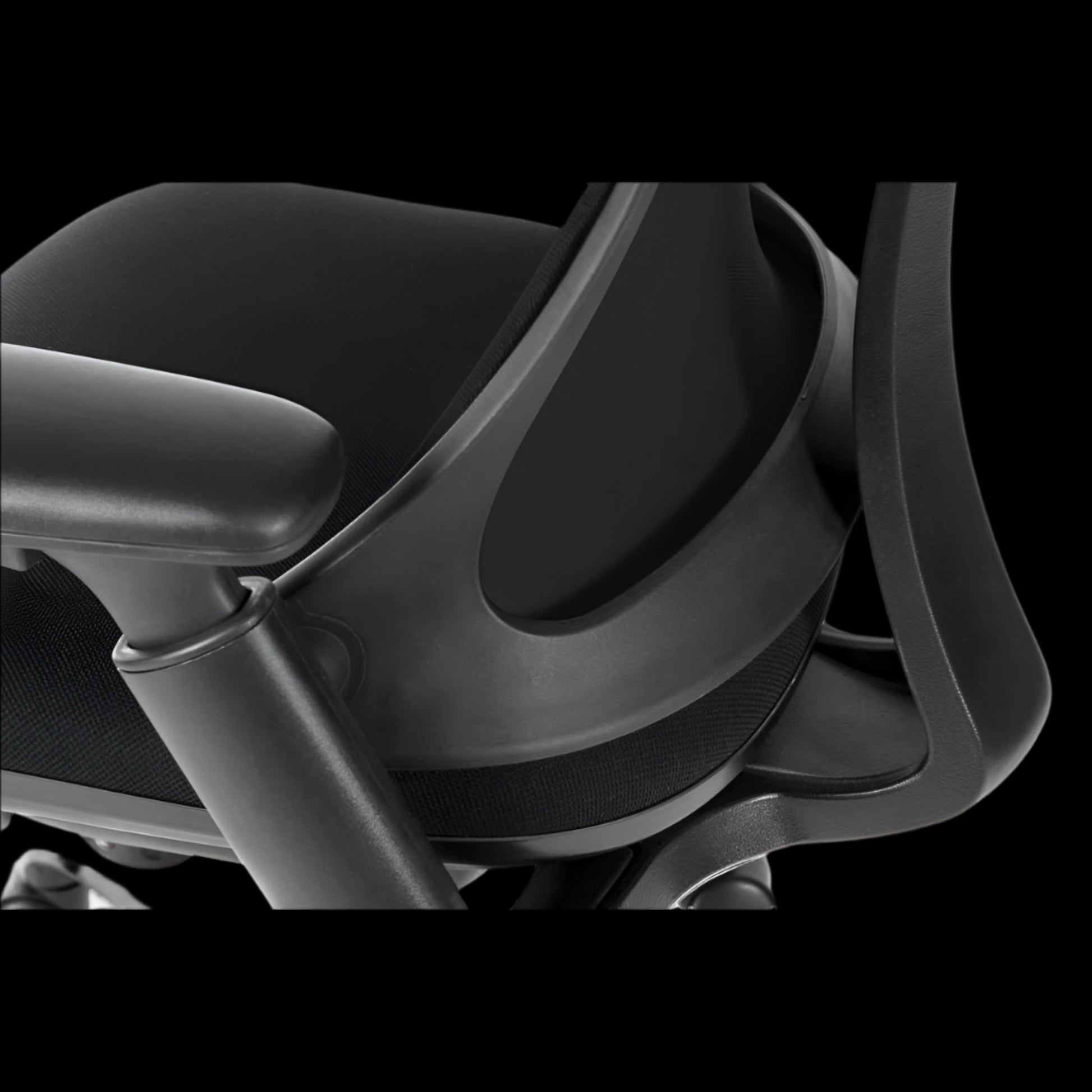 Close-up of a motorcycle seat with a black background