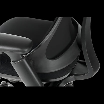 Close-up of a motorcycle seat with a black background