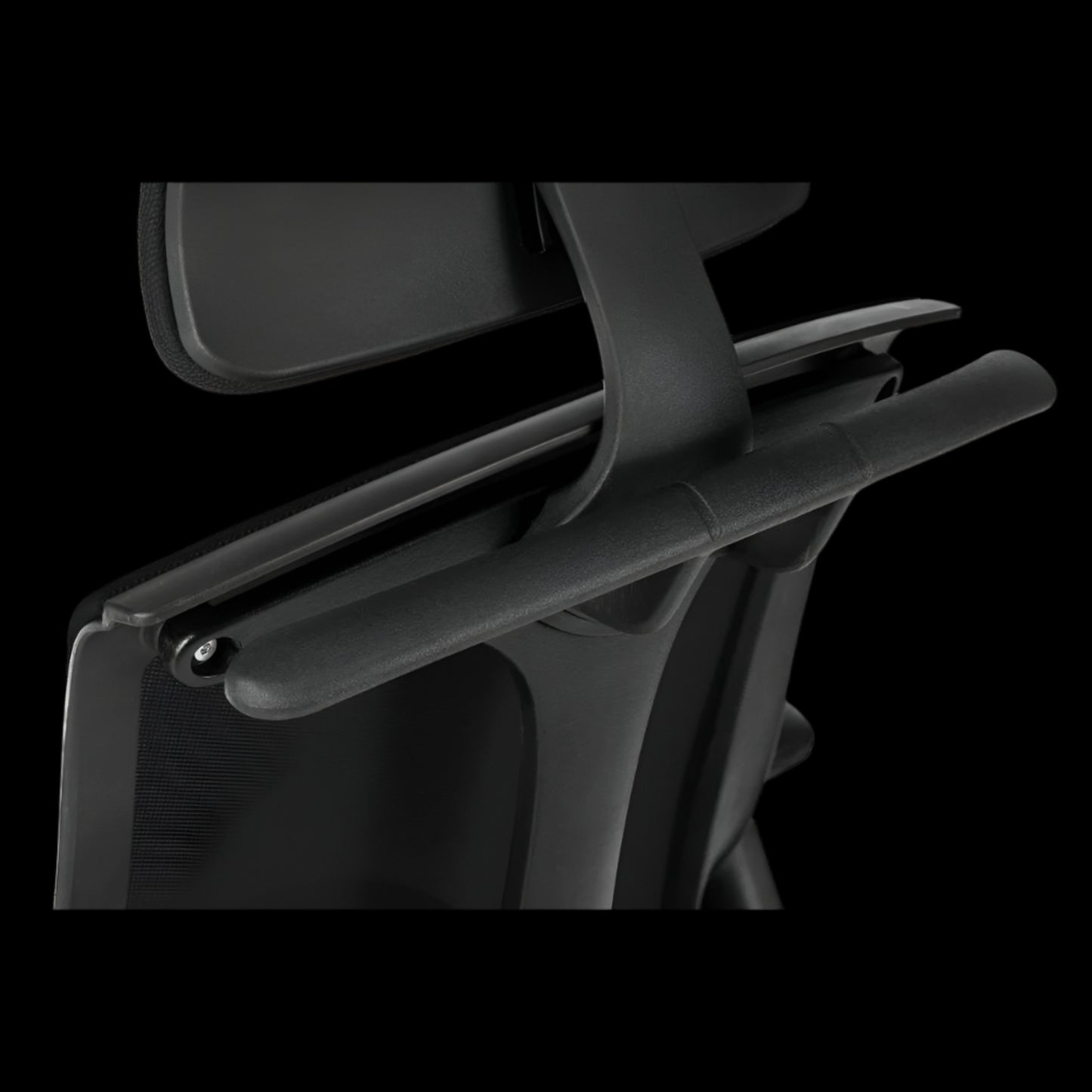 Black office chair with headrest on a black  background