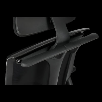 Black office chair with headrest on a black  background