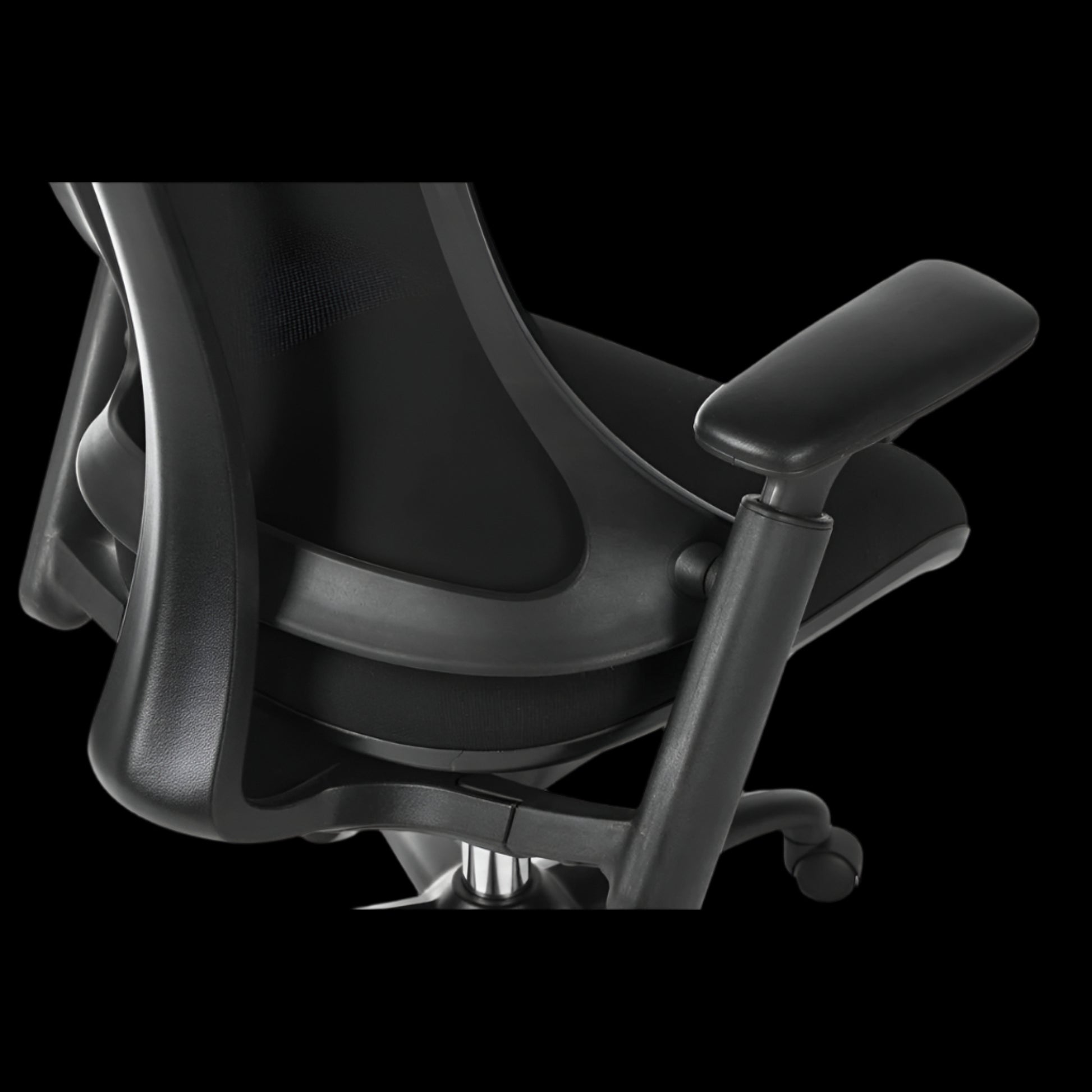 Black office chair with mesh backrest on a black background
