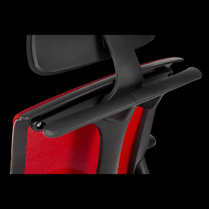 Close-up of a red and black office chair with a focus on the backrest and seat.