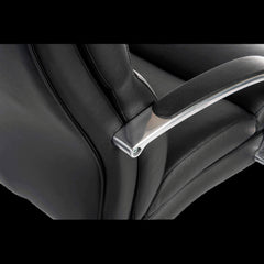 Close-up of a black leather office chair with armrest