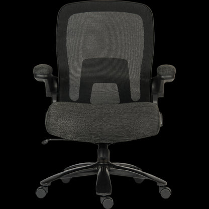 Black office chair with mesh back on a black background