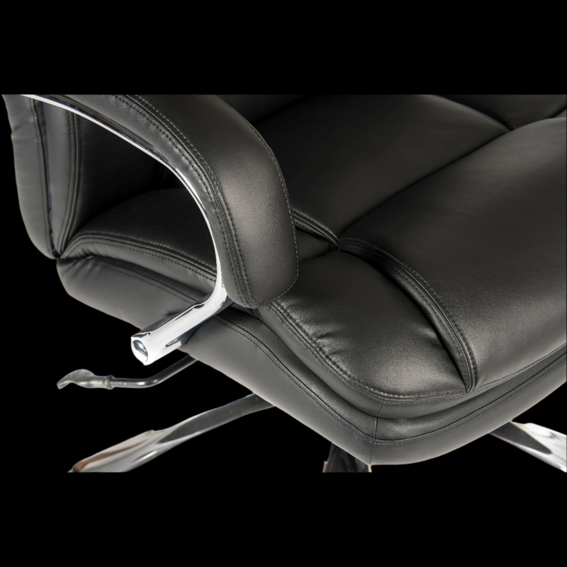Black office chair with a black background