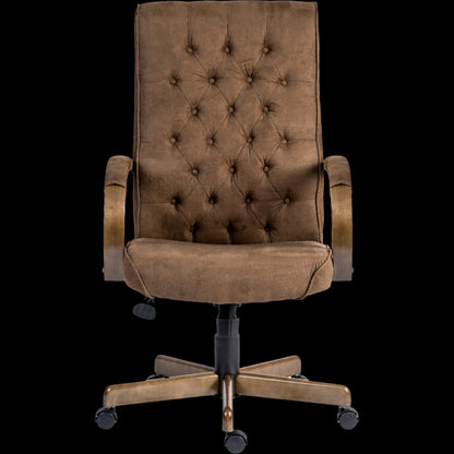 Brown tufted office chair on a black background
