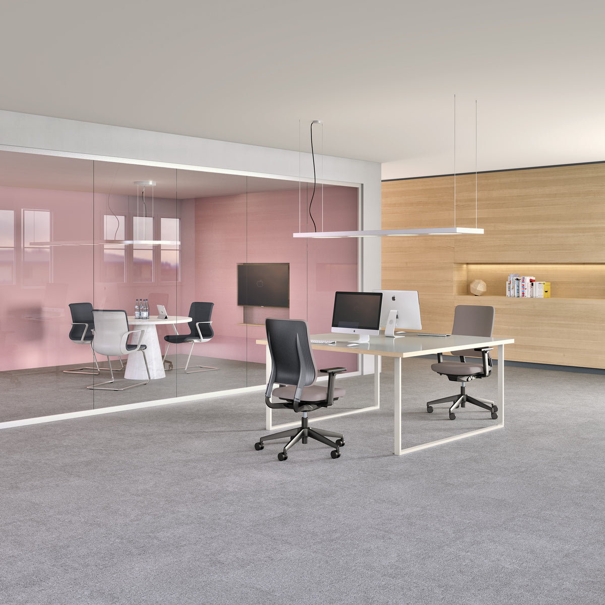 Drumback Task Chair at desks in an open-plan office beside a glazed meeting room