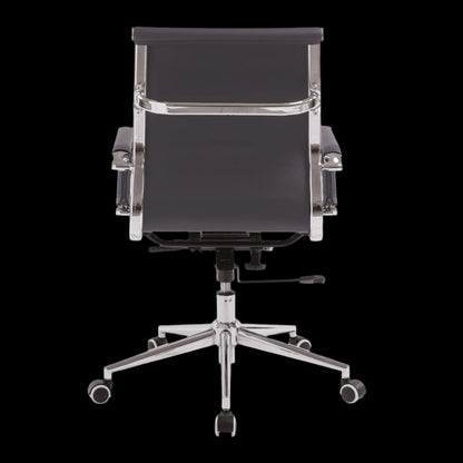 Black office chair with chrome base on a black background
