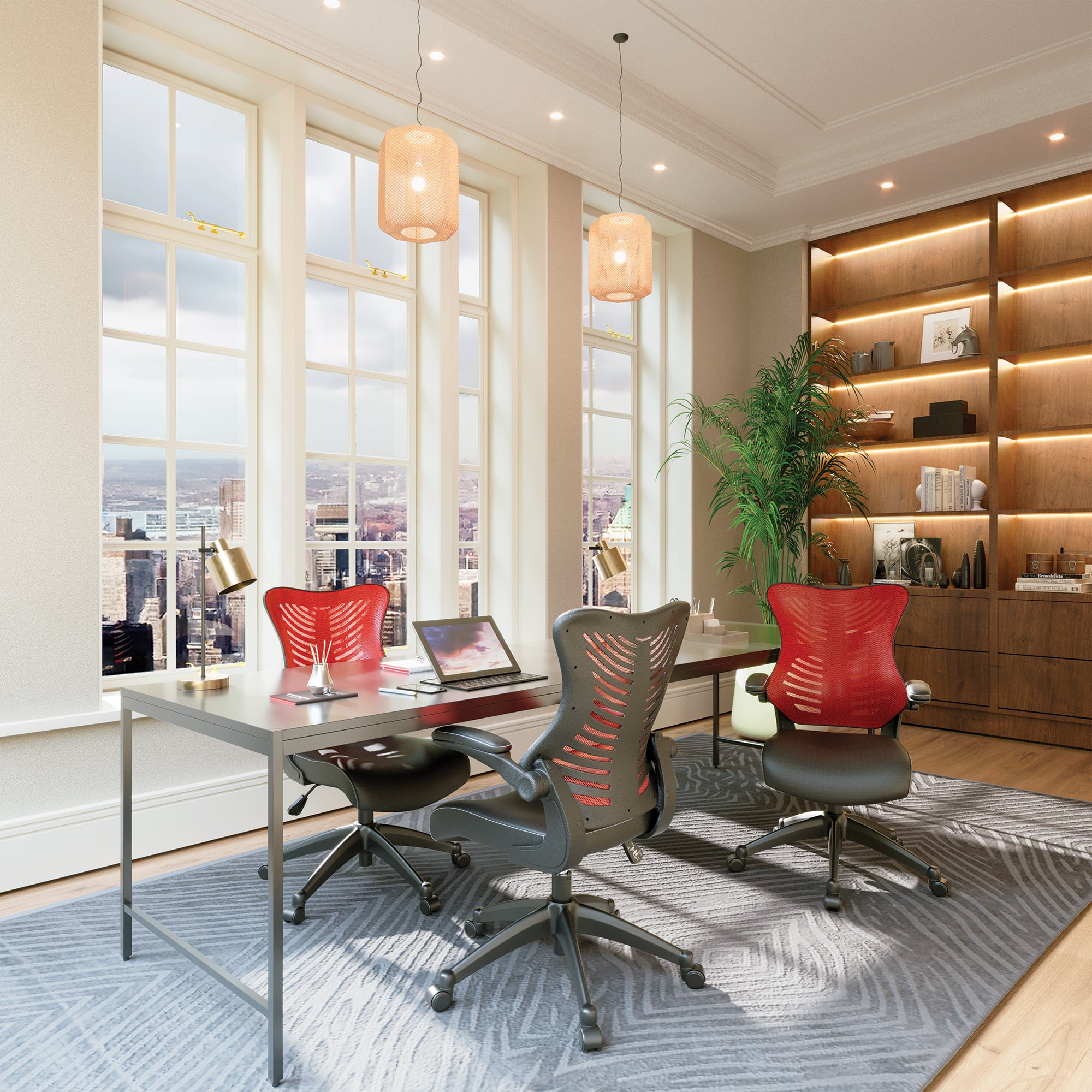 Modern office space with a desk, chairs, and large windows.