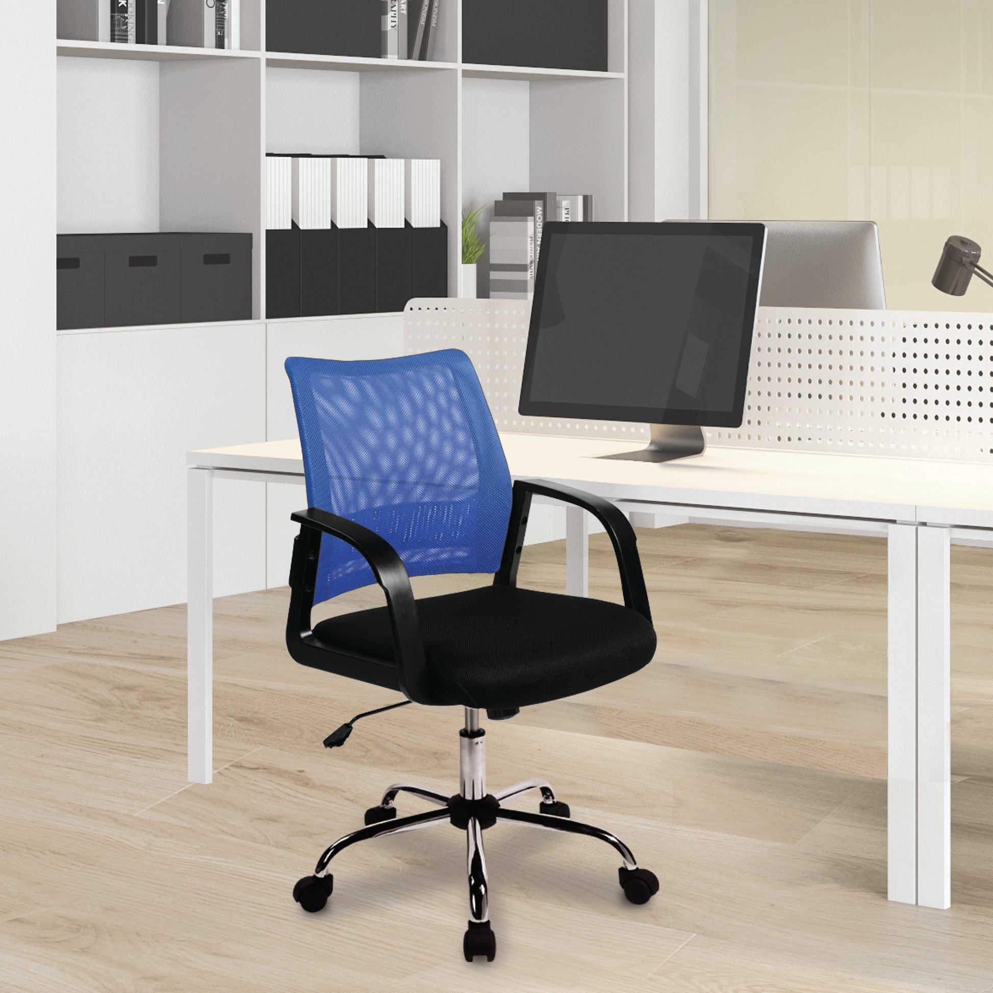 Blue office chair in front of a white desk with computer equipment.
