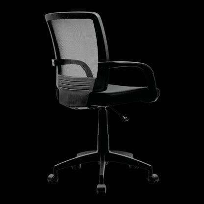 Black office chair with mesh back on a black background