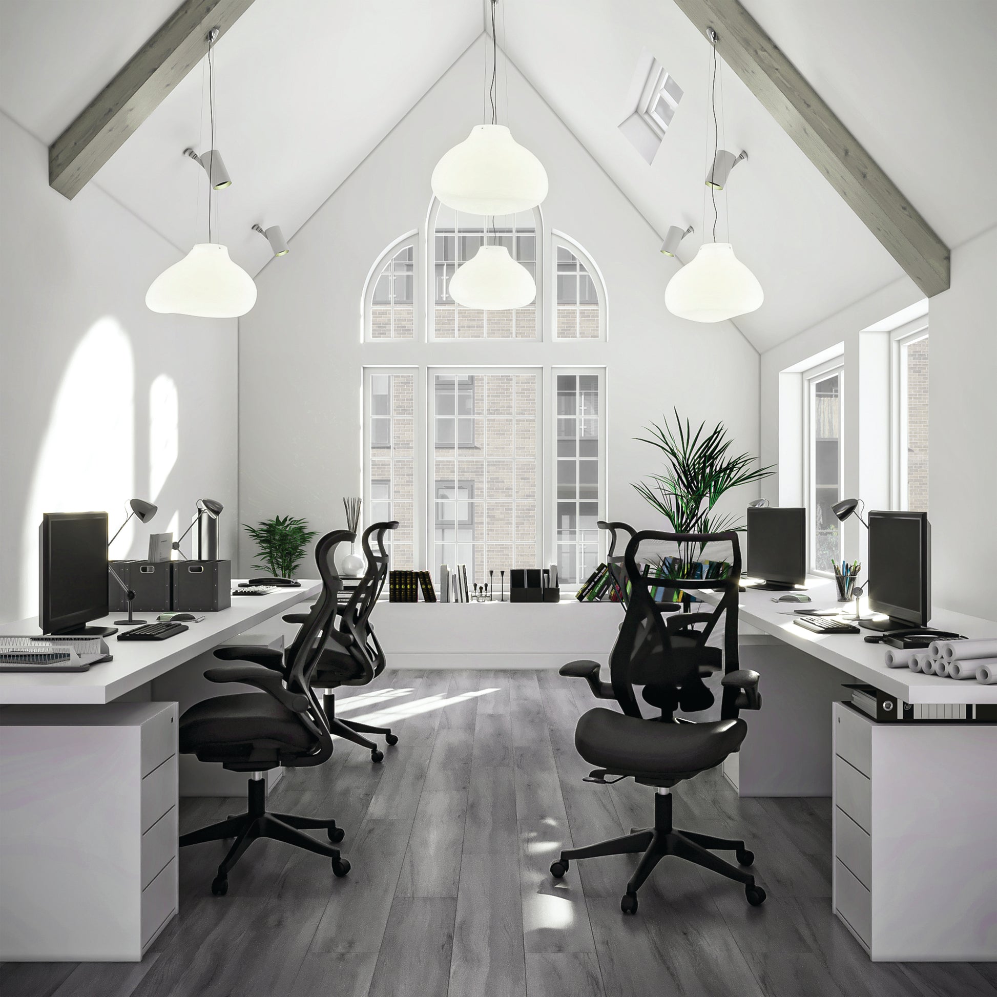 Modern office space with white desks, black chairs, and large windows.