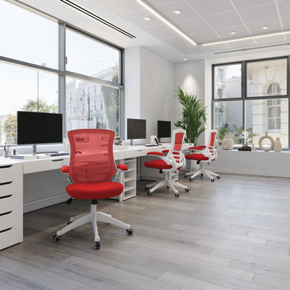 Modern office with red chairs and black desks
