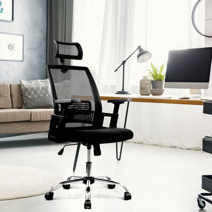Black office chair in a modern home office setting with a desk and computer.