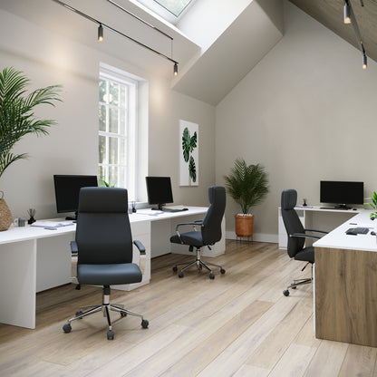 Modern office space with desks, chairs, and decor