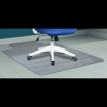 Blue office chair on a gray floor mat in a room with a green wall.