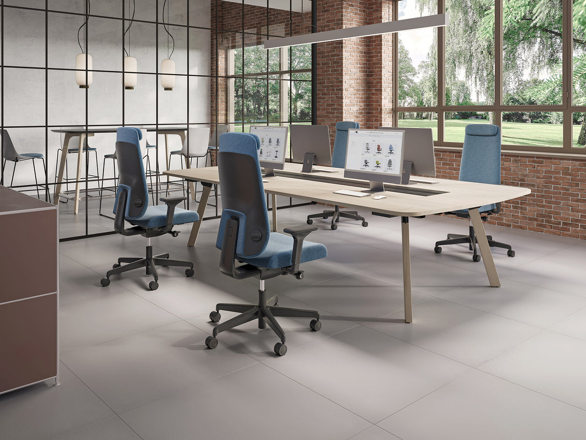 Prompt Task Chair with high backrests around a shared meeting table